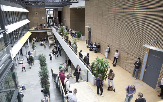 People in Maarintie 8 building hallway.