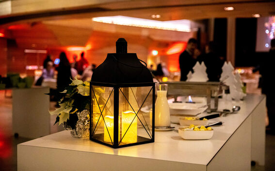 Candle lantern illuminates beautifully on Christmas table porridge table in Kaleva Hall