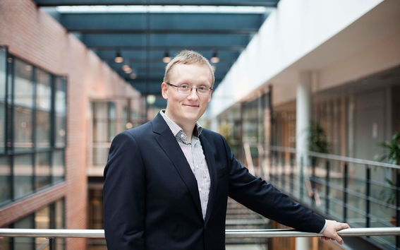 Antti at Aalto Unviersity smiling towards the camera
