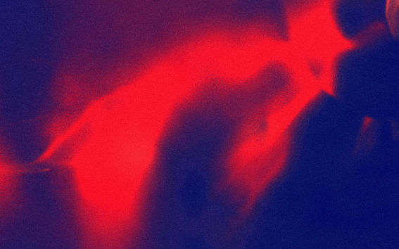 red color making sliding shapes on blue background