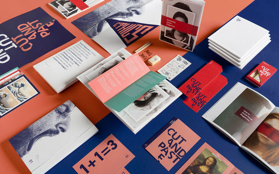 on a table a set of different booklets, books, postcards and a stationery kit