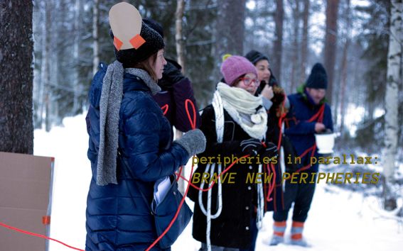 Artists from the peripheries in parallax research group take part in a performance: they hold a red string between them. They stand in a snowy forest.