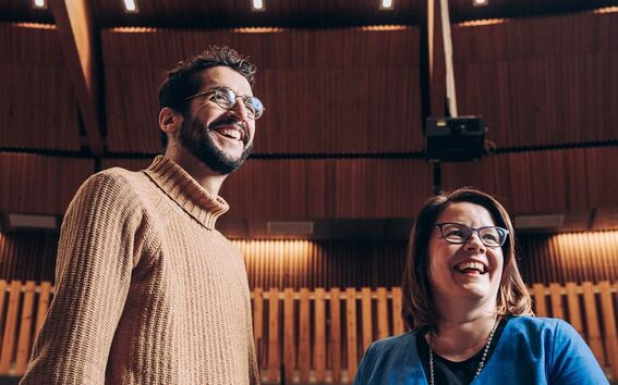 Two aalto people laughing in the picture