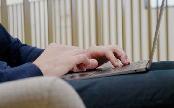 Student using his laptop
