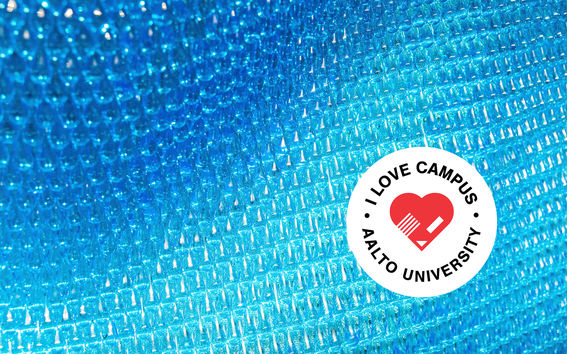 Blue glass pieces forming a wave and a I love campus logo on it
