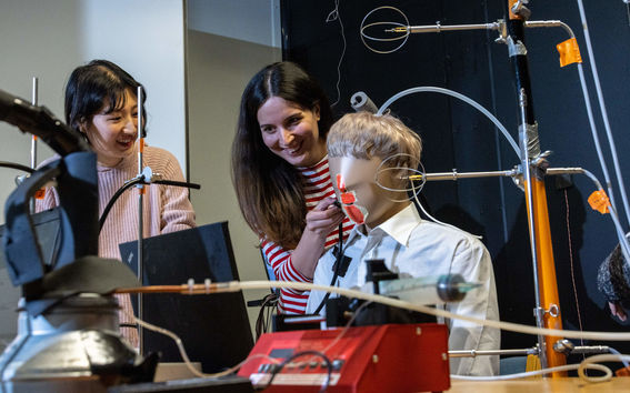 Students in the house lab with test dummy
