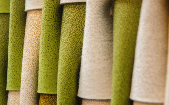 Soft textile surface with varying colours on display in an exhibition