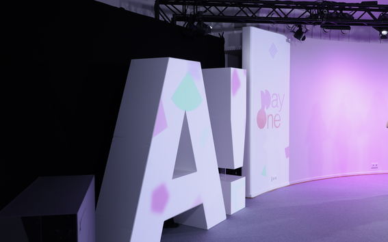 Aalto logo standing in purple coloured lights