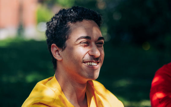 A headshot of student smiling.