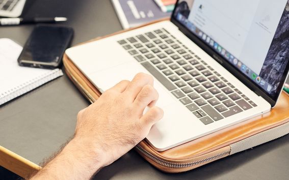 Image of working with a laptop