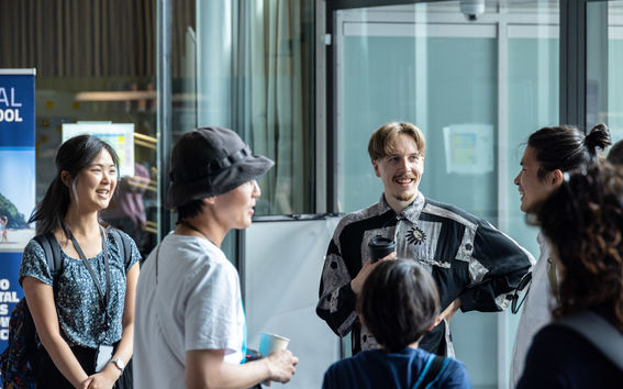 Students and teachers discussing.