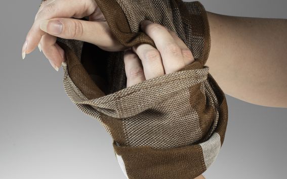 A scarf made with lignin-based yarns