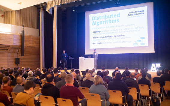 People following talk by Jukka Suomela in Dipoli, Otaniemi