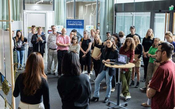 Students and staff discussing