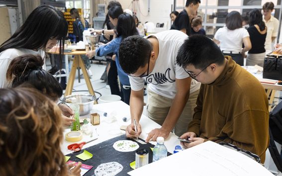 Students working on a group project during the Nordic Product Design course.