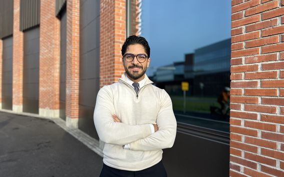 Dariush Salami, the teacher of the Introduction to AI and ML course at Aalto University Summer School, pictured outside the Marsio building on Aalto University campus.