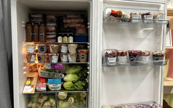 Aalto Foodsharing community fridge filled with food.