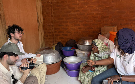Interview of a woman moving from an informal settlement to new social housing developed by NGO UrbaSEN, with support and translation provided by Magatte Diouf, Program Manager at UrbaSEN. Location: Dakar, Senegal. Photo by Sofia Pascolo, Aalto SGT Student