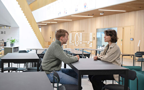 Two people having a conversation.