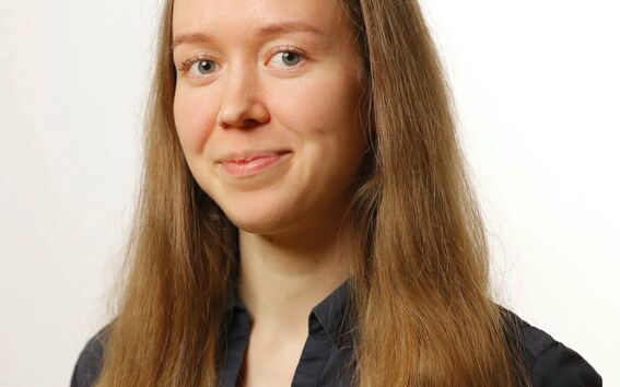 Mery wearing a dark shirt