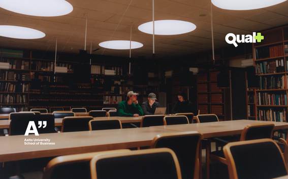 Students in the library. Qual+ and Aalto University School of Business logos added on top.