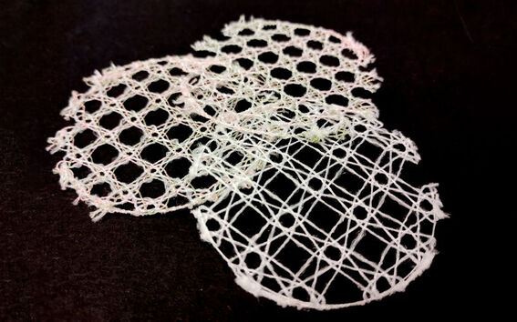 Image shows circular samples of yarns laced into textile structures