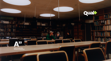 Students in the library. Qual+ and Aalto University School of Business logos added on top.