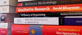 Stack of management books.
