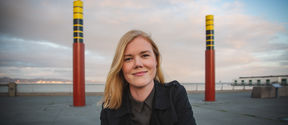 Close-up photo of Katja Toropainen standing at a bay.