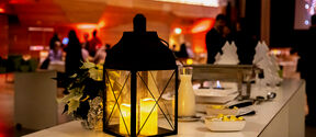 Candle lantern illuminates beautifully on Christmas table porridge table in Kaleva Hall