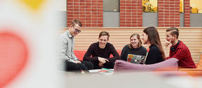 Photo showing a group of students working together