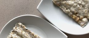 two white plates with tempeh-based biomaterial on them