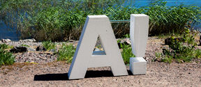 A logo on seaside, photo by MIkko Raskinen