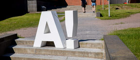 The Aalto logo on the steps going up to Undergraduate Center building
