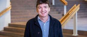 Potrait of smiling professor Guy Julier