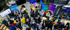 Students meeting companies in a networking event.
