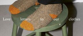 Feet in worn, brown socks with orange toes on a green stool. Text reads 'Love letters to our clothes'.