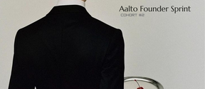 From behind, a person in a black suit and white apron holding a tray with a single cherry. Text reads 'Aalto Founder Sprint'.