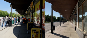 Split image of a busy shop entrance on the left and an empty sidewalk with closed shops on the right.