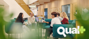 People working together in the Business School lounge. Qual+ logo added on top.
