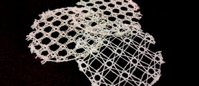 Image shows circular samples of yarns laced into textile structures
