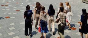 Student team walking in the Van Lang university campus, Vitenam. Photo taken by Johanna Isopuro.