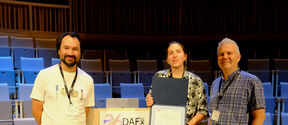 Gloria Dal Santo (middle) and her advisors, Prof. Sebastian Schlecht (left) and Prof. Vesa Välimäki (right) received the Best Paper Award diploma at the MIT Music building.