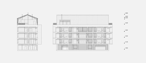 Architectural section of a multi-storey building showing detailed sectional views of different floors.