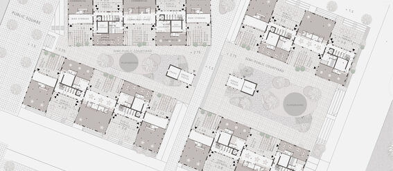 A detailed architectural site plan showing multiple buildings, courtyards, playgrounds, and designated commercial spaces.