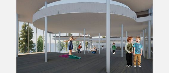 Children play in a large, open, modern kindergarten with large windows and round architecture features.