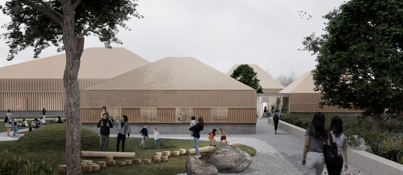 Modern wooden buildings with sloped roofs, people walking and children playing outside on a cloudy day.