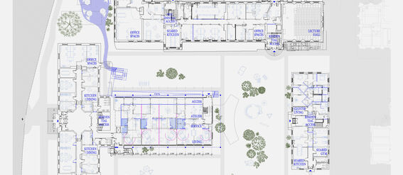 Architectural ground floor plan showing various rooms including offices, kitchens, lecture hall, gym, and garden areas.