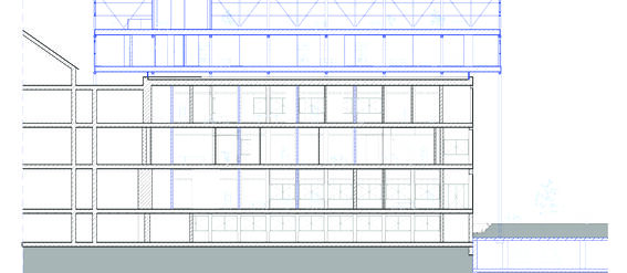 Architectural section drawing of a multi-storey building with detailed structural elements and interior spaces.