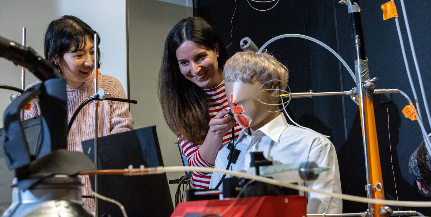 Students in the house lab with test dummy